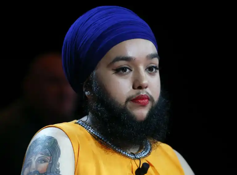 Youngest female with a full beard